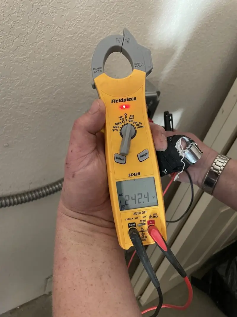 Voltage testing with clamp meter during Circuit Breaker Repair in Wyoming